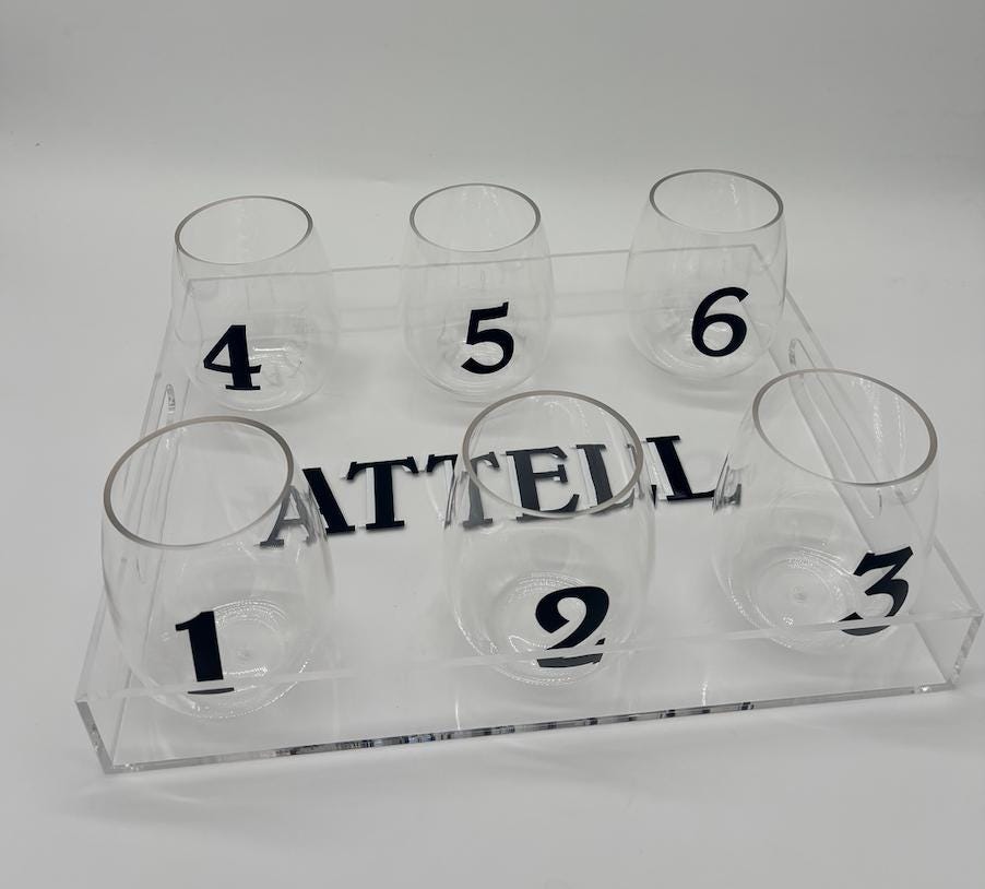 Personalized 11" x 14" clear acrylic tray with your name and 6 stemless wine glasses with vinyl numbers