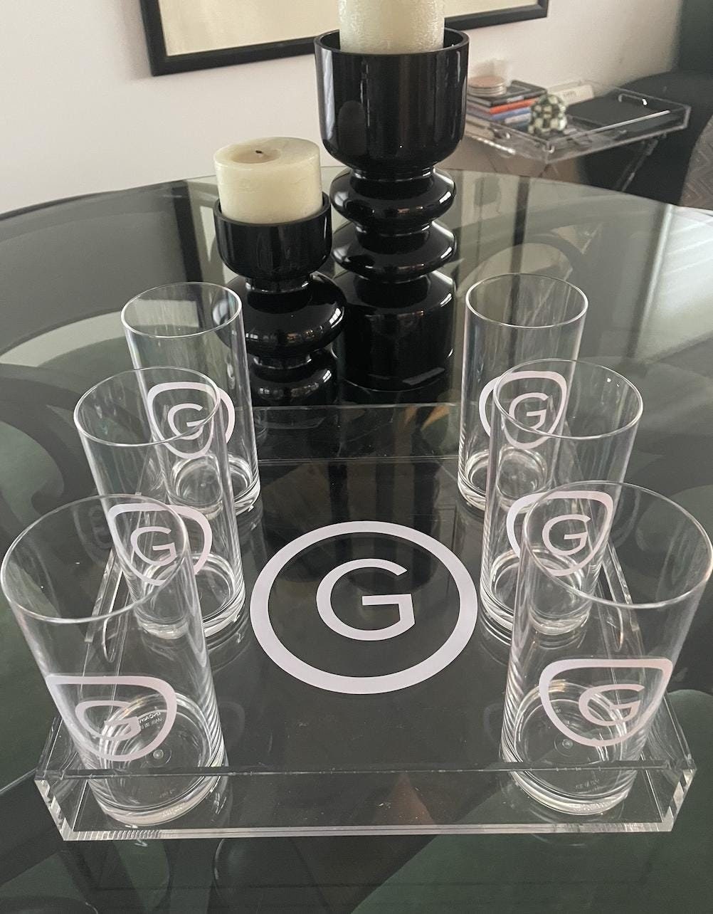 Personalized 12" x 12" clear acrylic tray with a vinyl monogram in the center and 6 monogrammed glasses