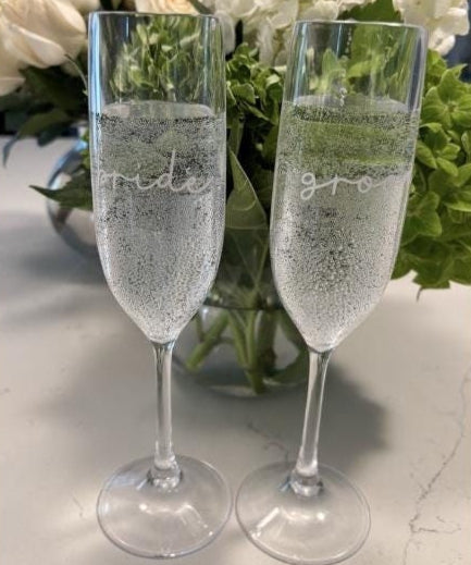 Personalized clear acrylic champagne glasses, bride and groom set