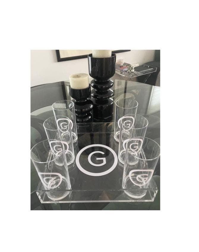 Personalized 12" x 12" clear acrylic tray with a vinyl monogram in the center and 6 monogrammed glasses