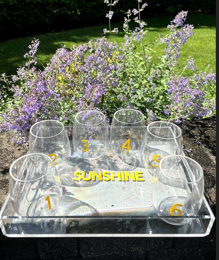 Personalized 11" x 14" clear acrylic tray with your name and 6 stemless wine glasses with vinyl numbers