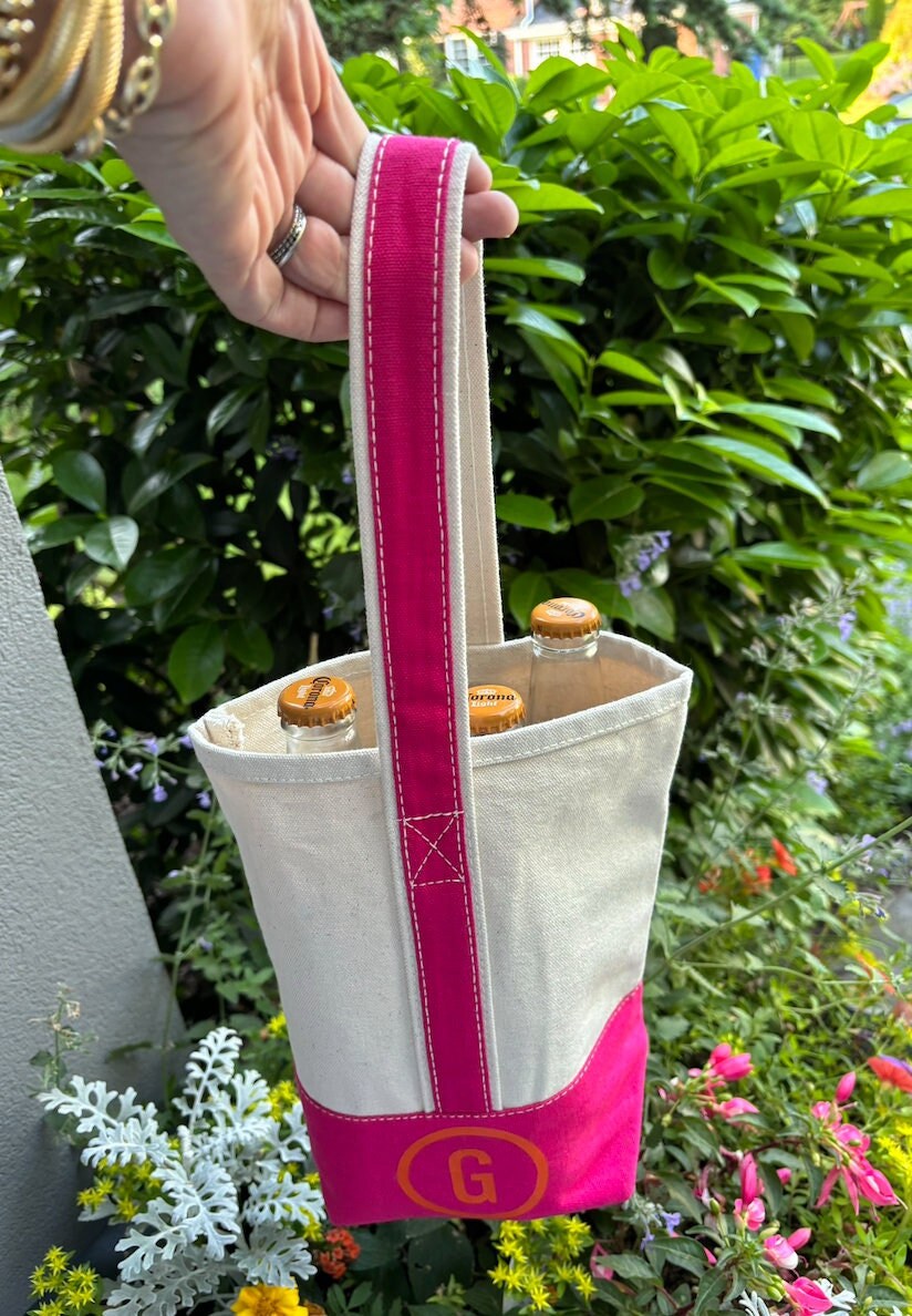 Personalized heavy canvas double wine travel carrier bag with pink straps, 9" x 10" x 4".