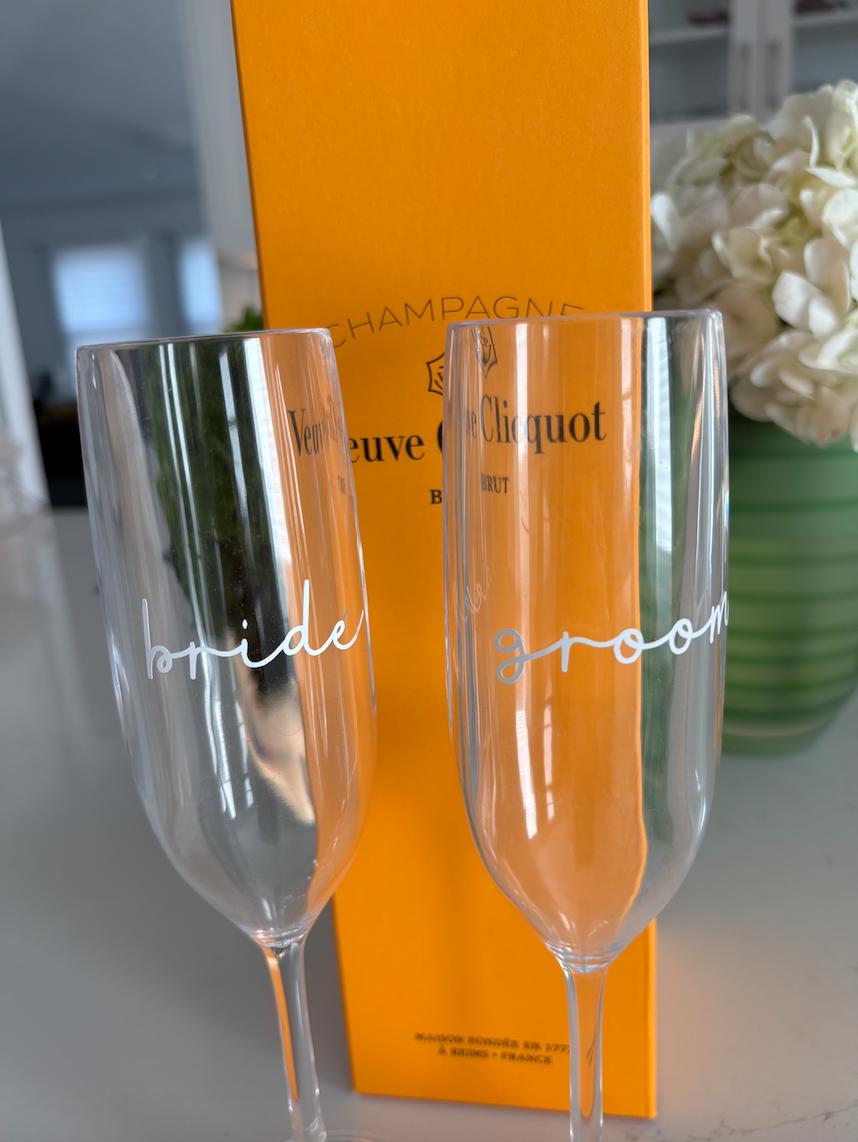 Personalized clear acrylic champagne glasses, bride and groom set