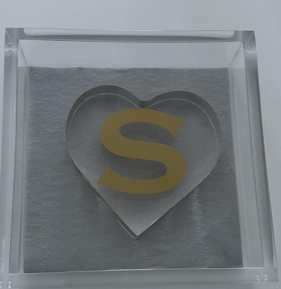 Personalized 6" x 6" clear acrylic napkin holder with personalized acrylic heart weight