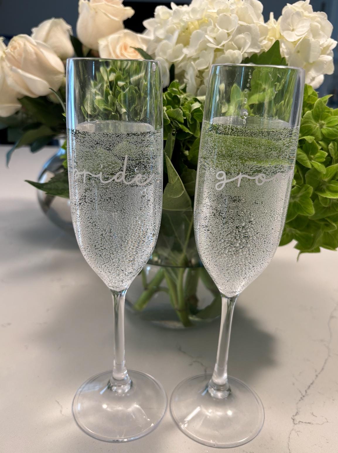 Personalized clear acrylic champagne glasses, bride and groom set