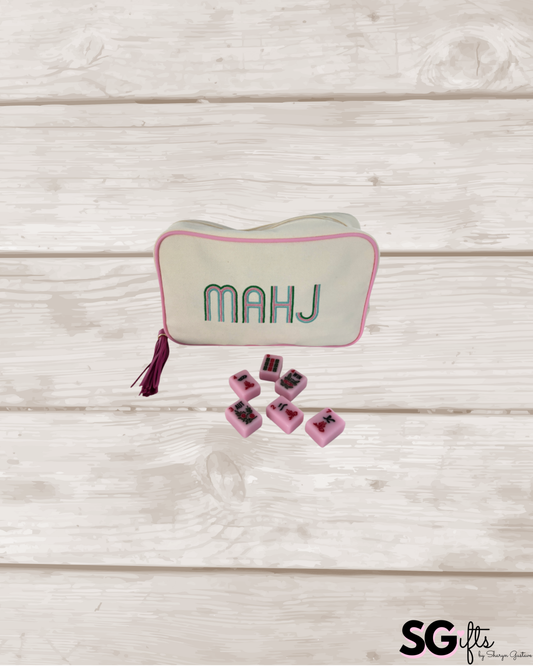 Ivory canvas mahjong tile bag with a full set of pink mahjong tiles