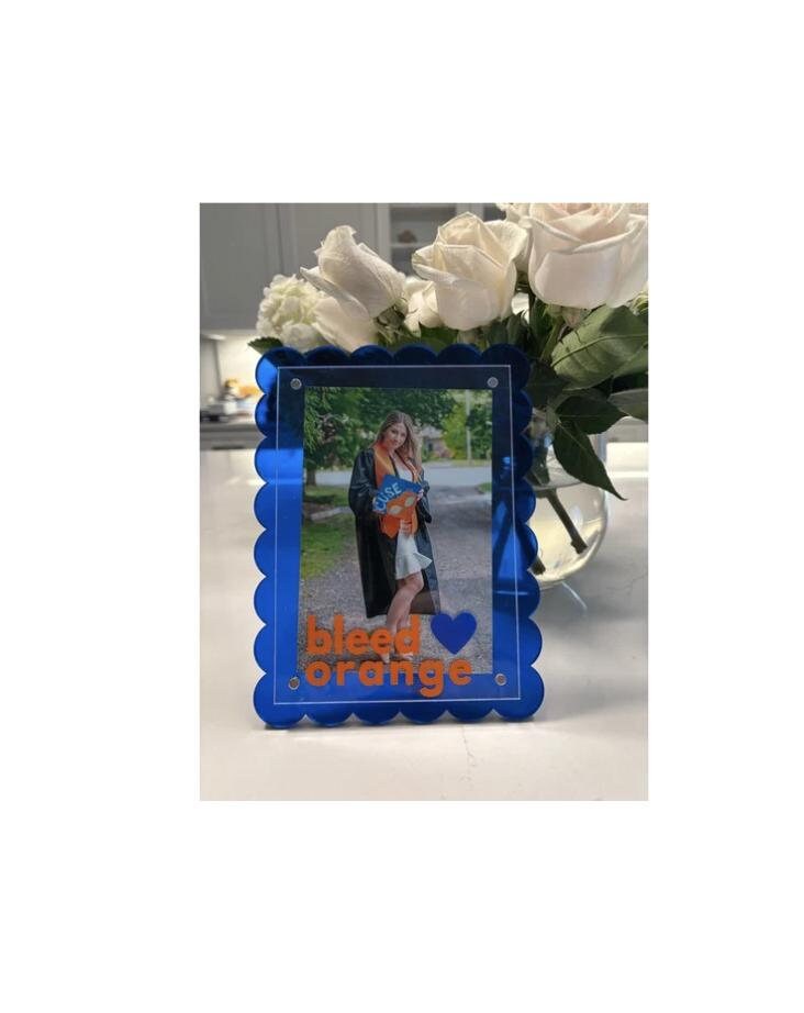 Customizable 7" blue scalloped edge acrylic BLEED ORANGE magnetic frame