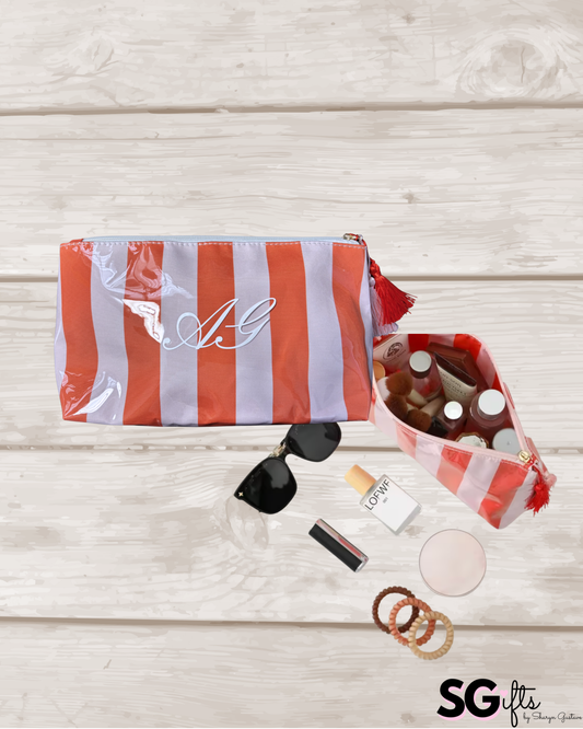 Personalized coated travel makeup bag with tassel closure- pale pink/red
