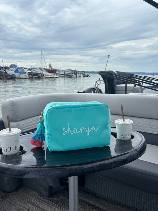 Personalized turquoise nylon makeup bag with your name