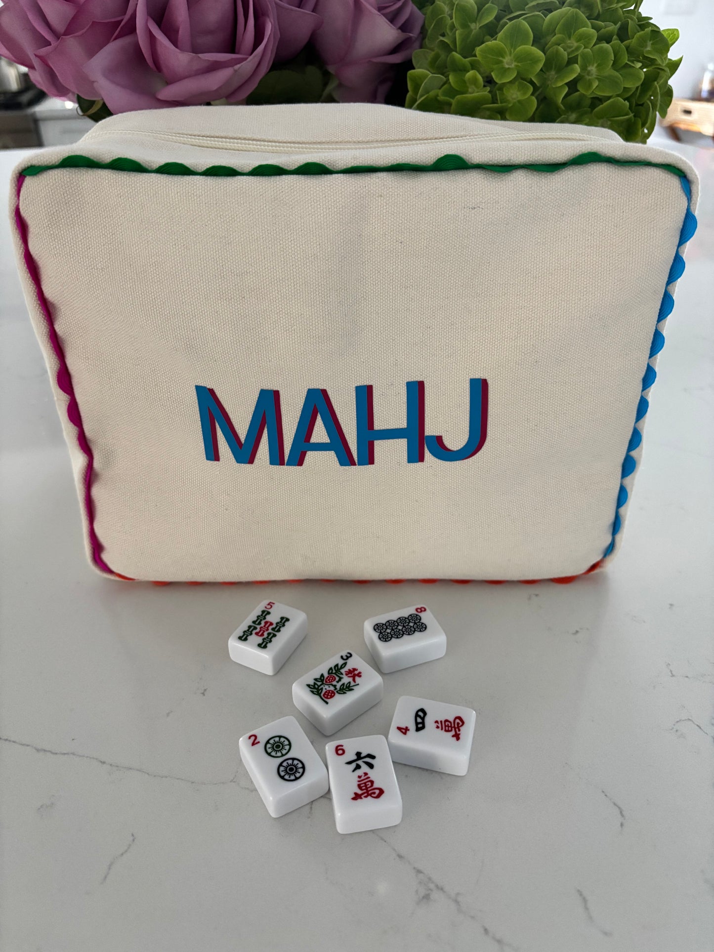 Ivory canvas mahjong tile bag with a full set of ivory mahjong tiles