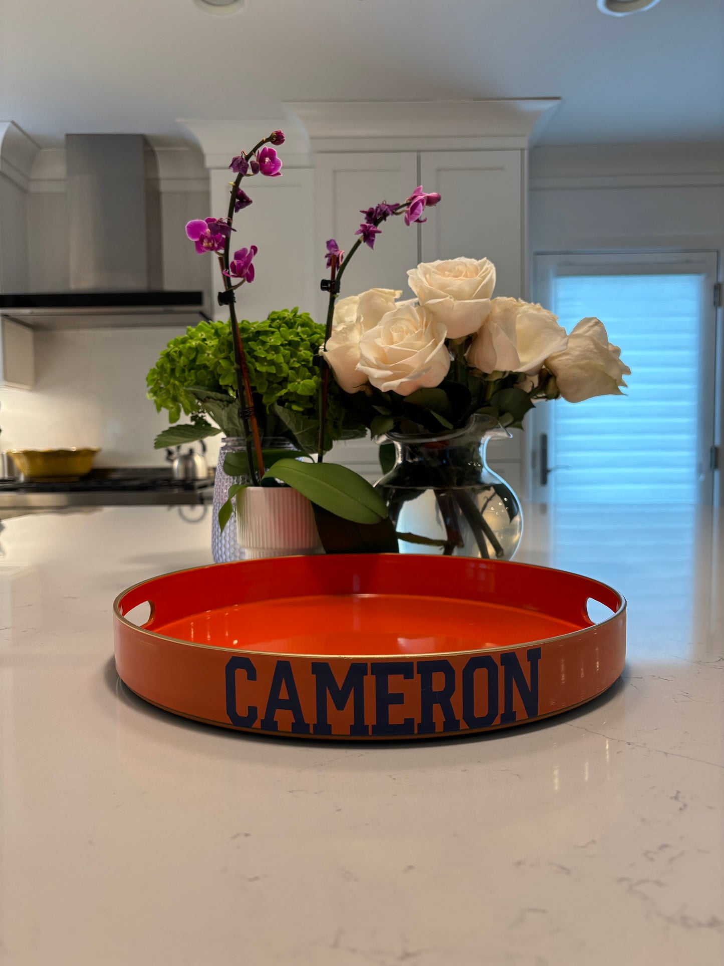 Pesonalized 13" opaque orange round tray with your name on the side