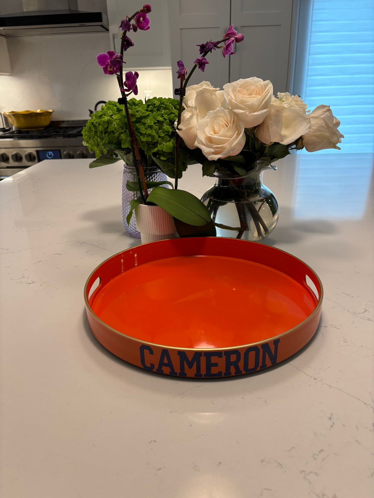 Pesonalized 13" opaque orange round tray with your name on the side