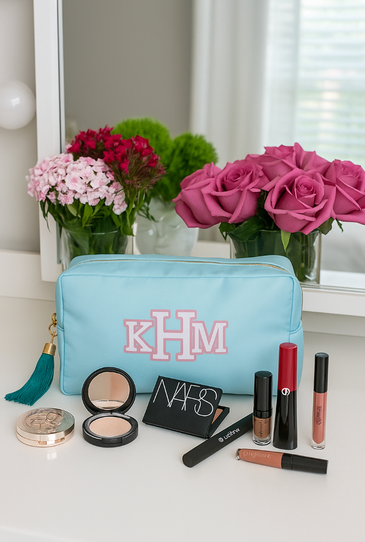 light blue nylon makeup bag with classic monogram