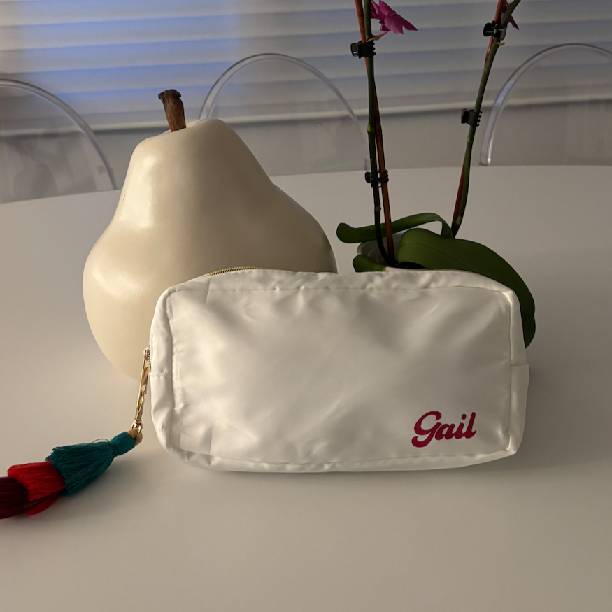 personalized white nylon 9.5" x 5"  makeup bag with name and tassel