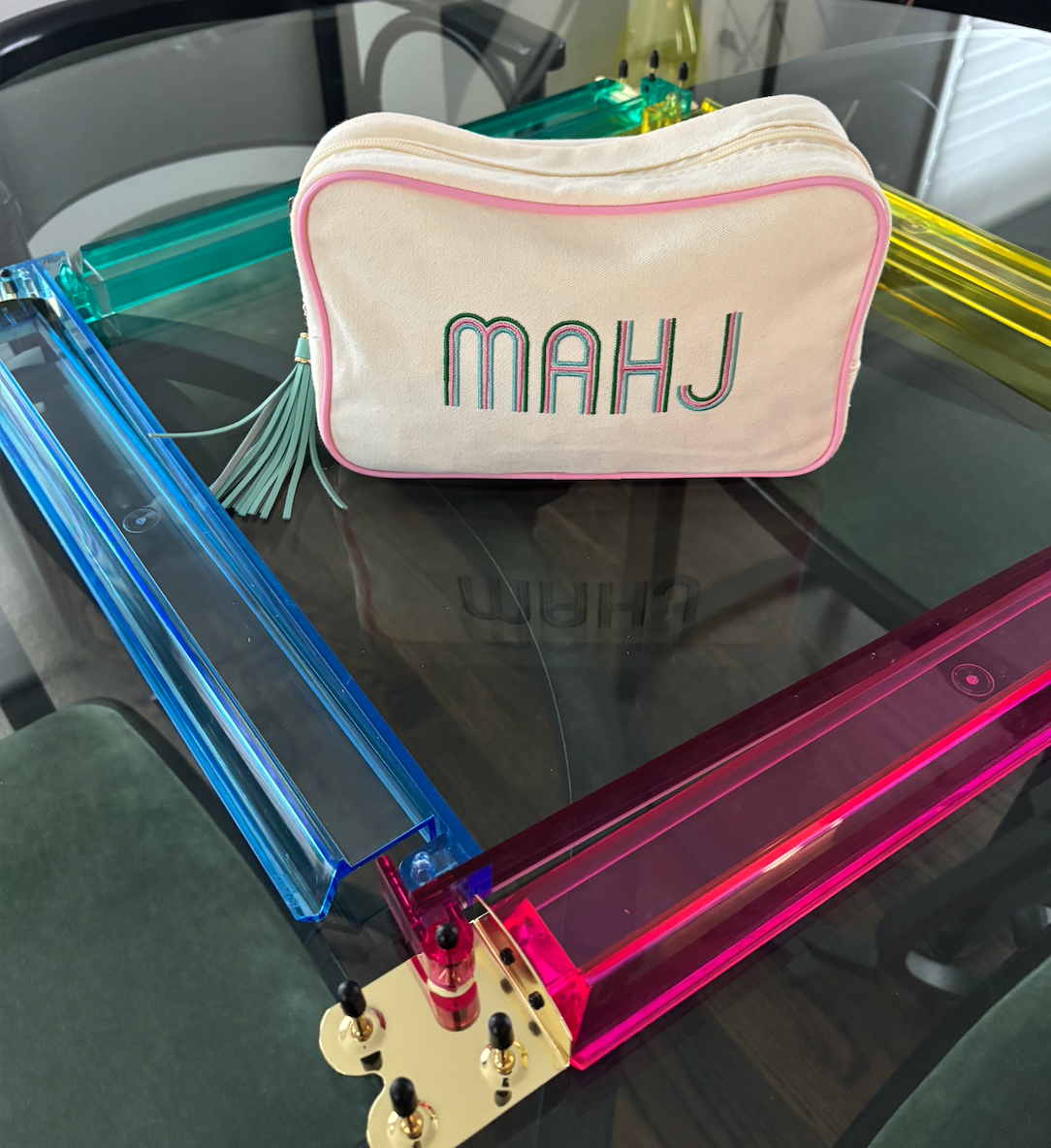 Ivory canvas mahjong tile bag with a full set of pink mahjong tiles